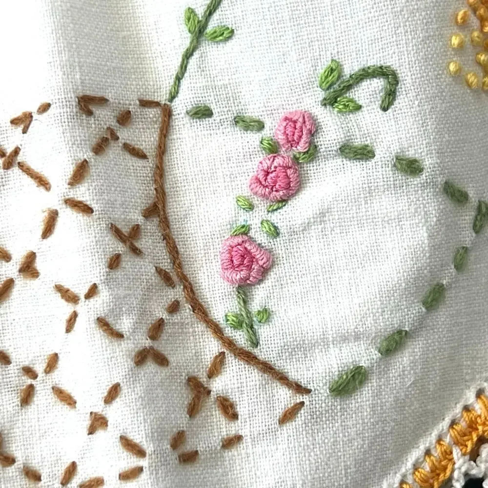 Vintage cross stitch embroidered two standard pillow cases. Roses